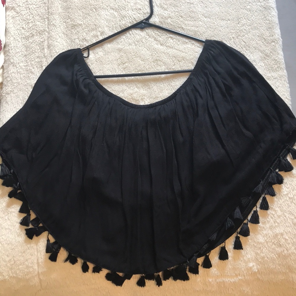 black off the shoulder tasseled shirt